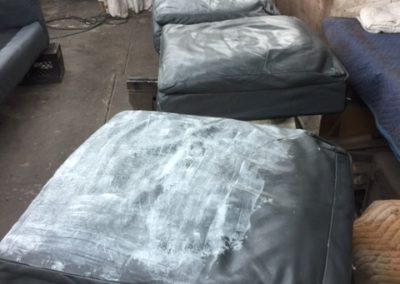 Damaged Leather Couch